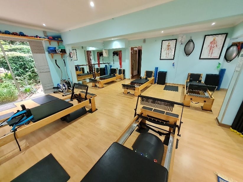 Reformers and Pilates equipment in the Pilates Dynamics studio