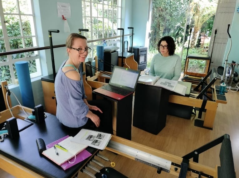 Pilates Dynamics instructors together in the studio