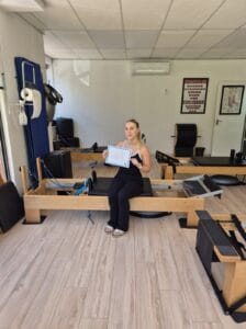 Certified Pilates instructor who completed a course.